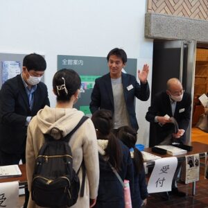Employee volunteers at the reception